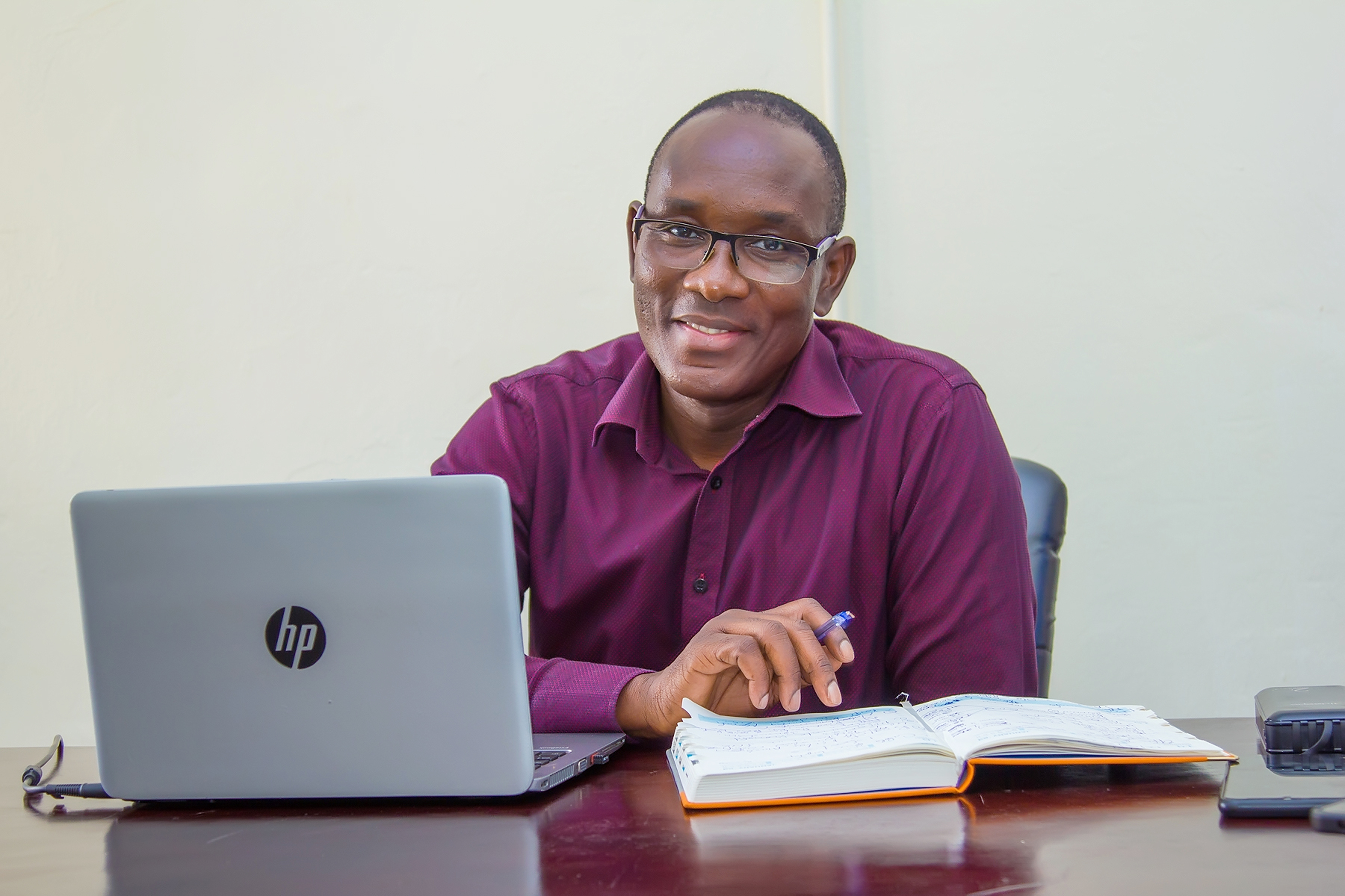 Dr. Charles Ogwel, Founder & Director